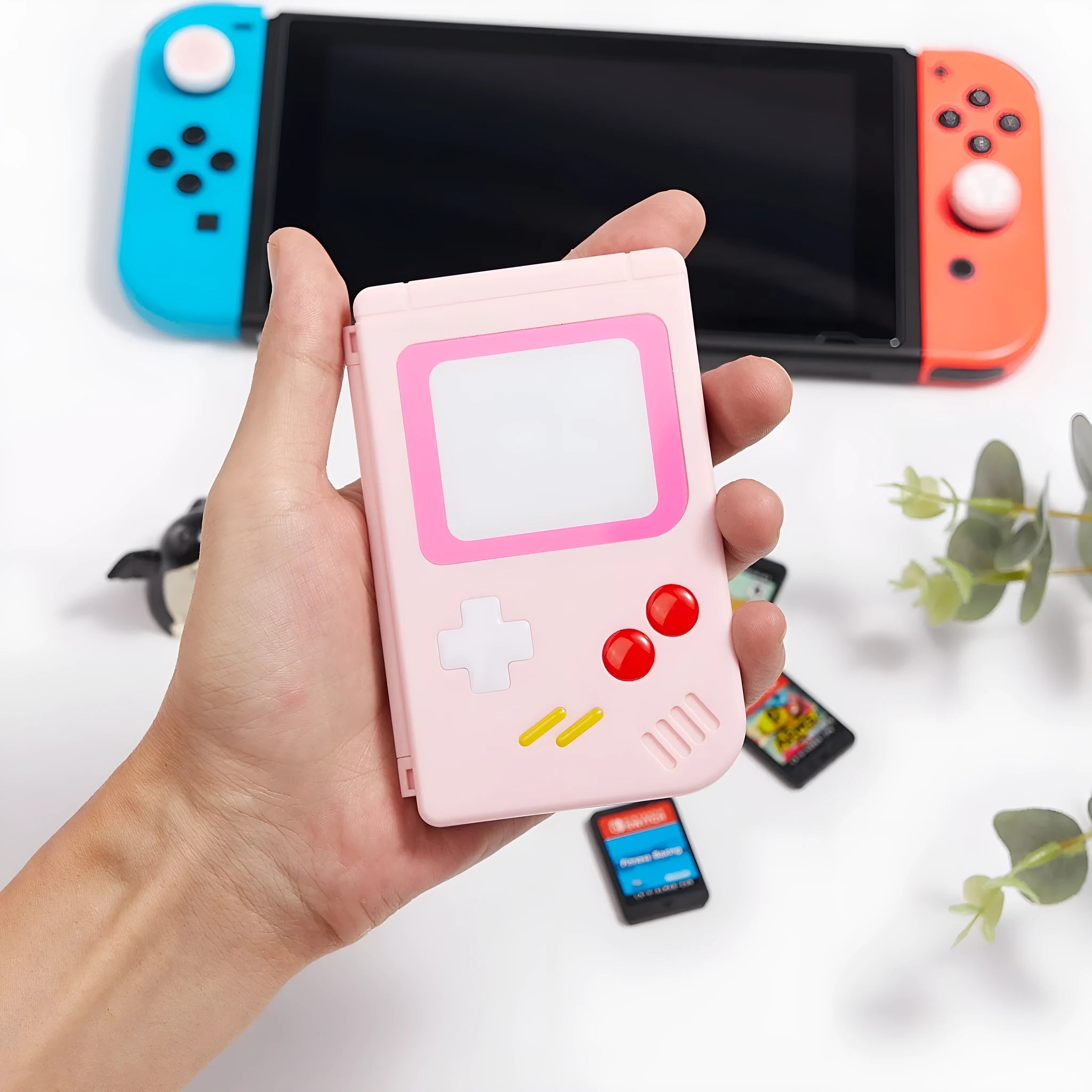 Nintendo Switch game card storage box in blue, pink, and white colours