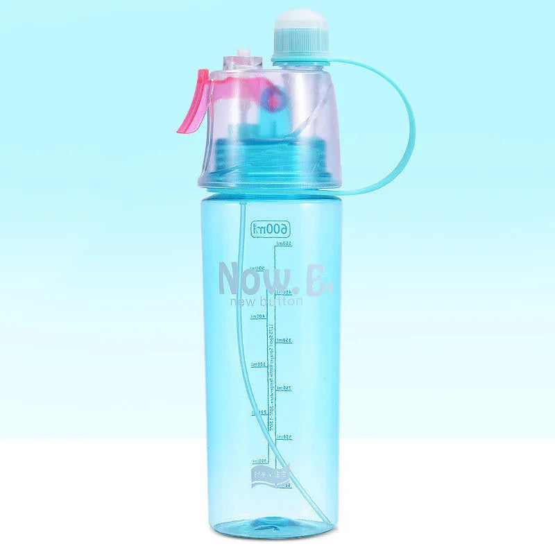Green portable outdoor mist spray cup with handle, leakproof pad, and visible water level scale.