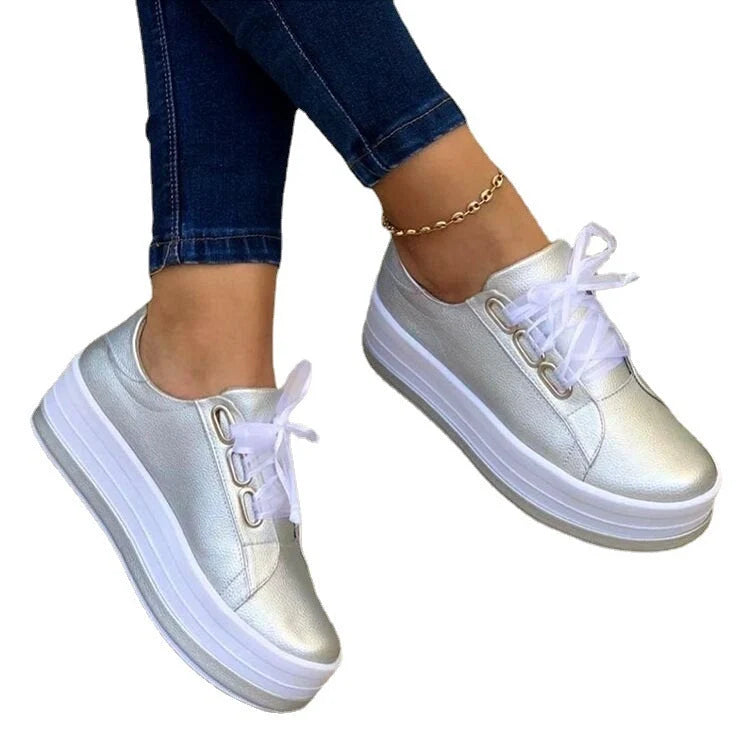 Women's ribbon lace-up platform sneakers in black, gold, silver, and rose gold