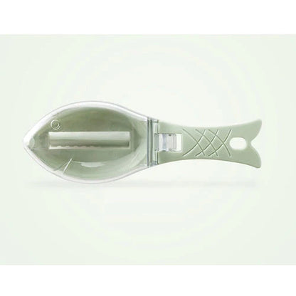 Fish scale scraper in white, green, and blue with hanging hole for easy storage