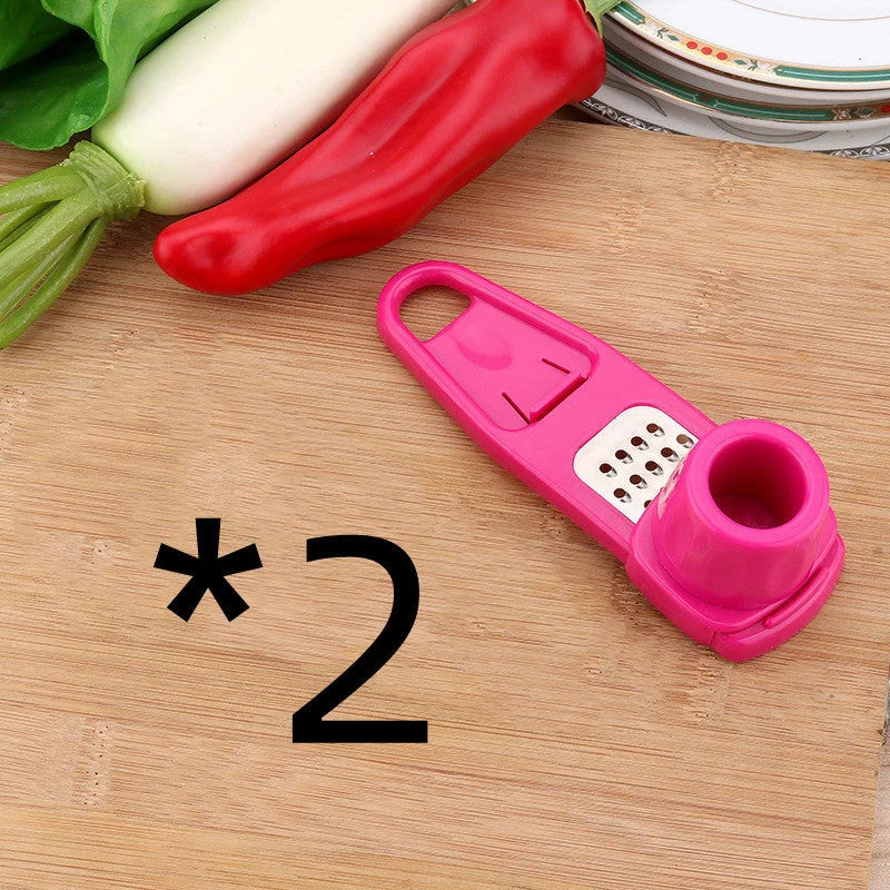 Eco-friendly garlic masher and seasoning grinder in rose red and light green