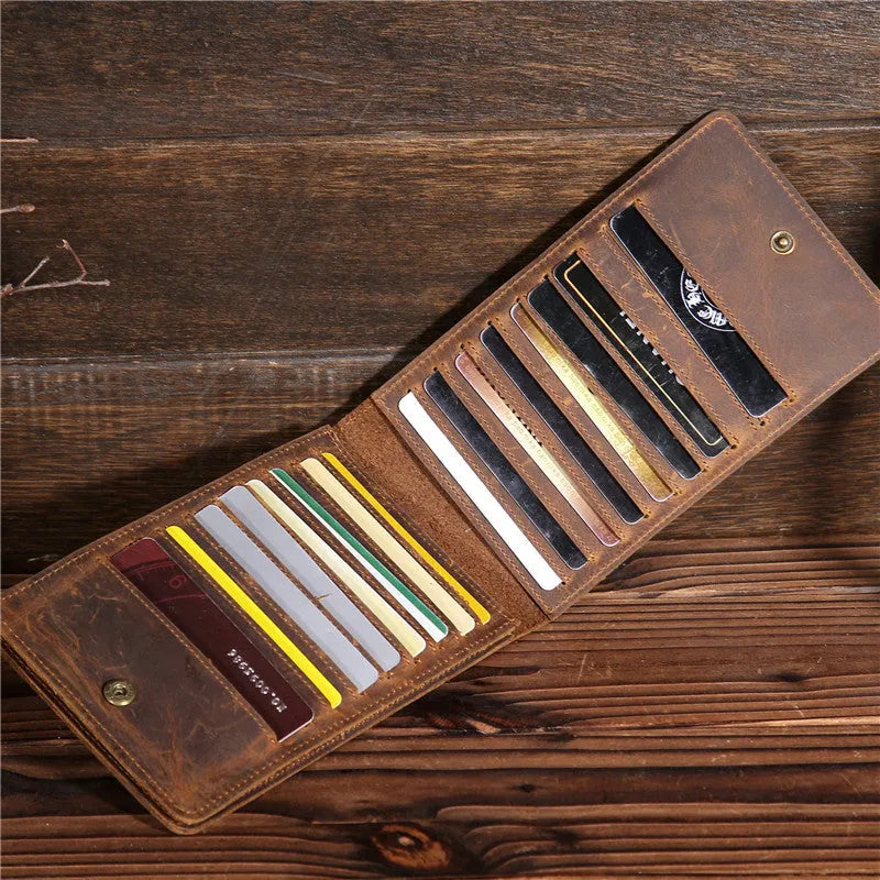 Men's cowhide card wallet with multiple slots shown open, displaying card and phone compartments.