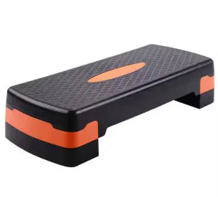Grey ABS plastic aerobic step platform for fitness workouts, showing its size and texture.