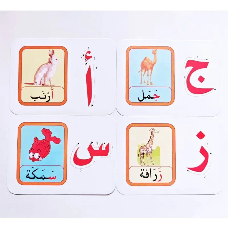 28 paper children's recognition literacy cards covering English and number learning laid out on a flat surface
