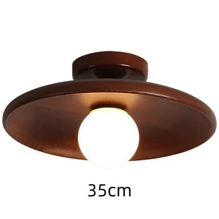 Solid wood ceiling lamp with glass shade in minimalist circular design