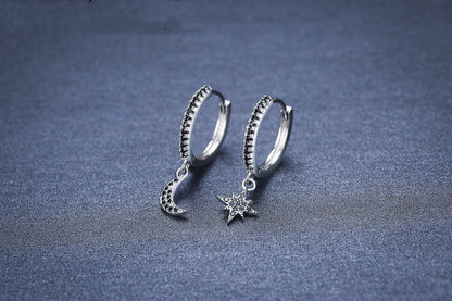 Black copper star and moon earrings for women with a natural style