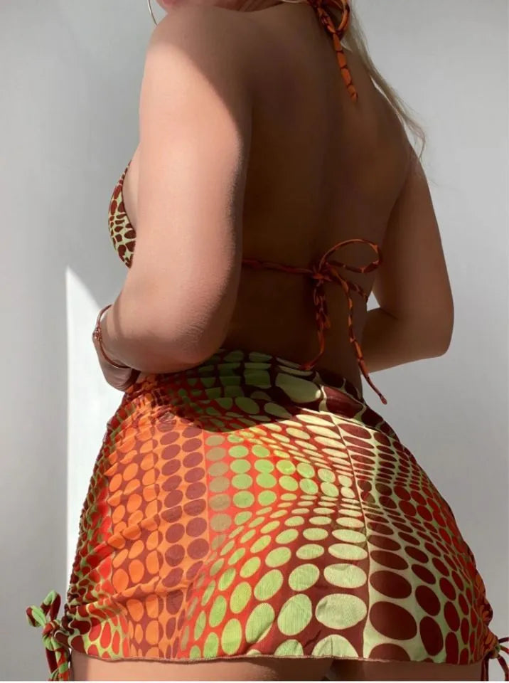 Printed split bikini women's swimsuit set with chest pad, high-waist skirt, shorts, and headband in polyester, picture colour