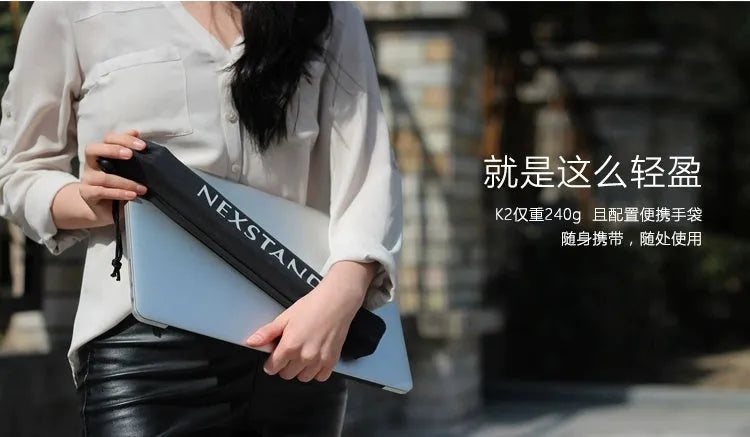 Black foldable portable laptop stand with enhanced nylon construction shown with travel case