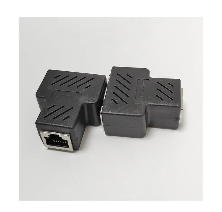 White RJ45 three-way network cable splitter adapter with one input and two output ports.