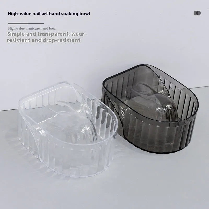 Plastic manicure bowl in transparent colour for nail soaking on white background