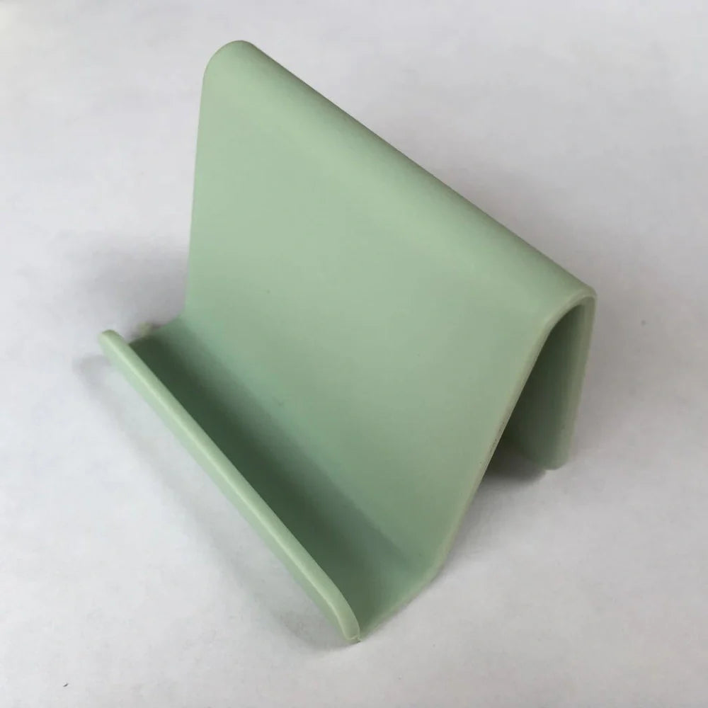 Candy colour plastic phone holder showing 6cm width and 4.5cm height dimensions
