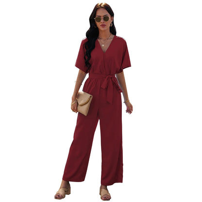 Women's V-neck tie waist jumpsuit in black, dark red, and sky blue