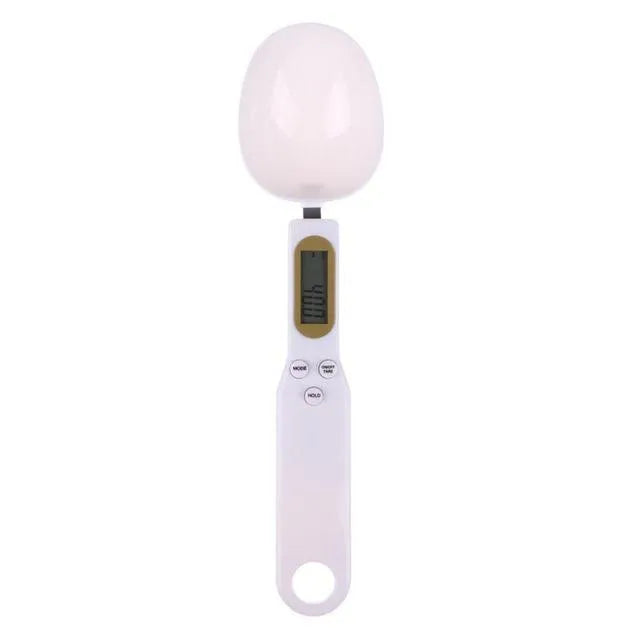 Digital spoon kitchen scale with LCD display showing weight measurement in grams