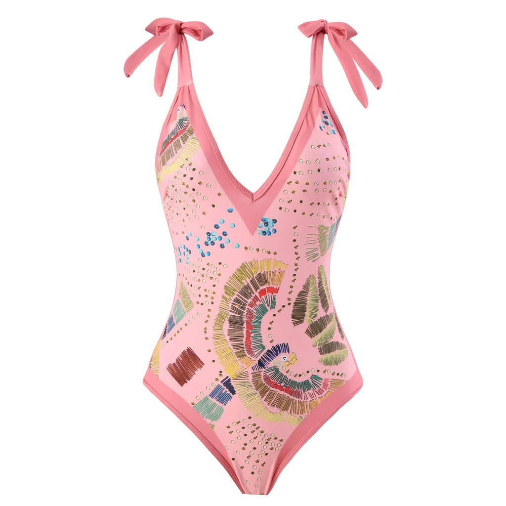 French retro blue one-piece swimsuit with gauze skirt on beach