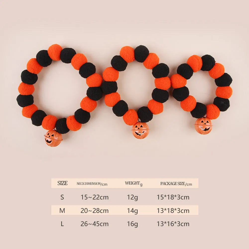 Orange Halloween pet collar with black trick-or-treat pumpkin design on a cat.