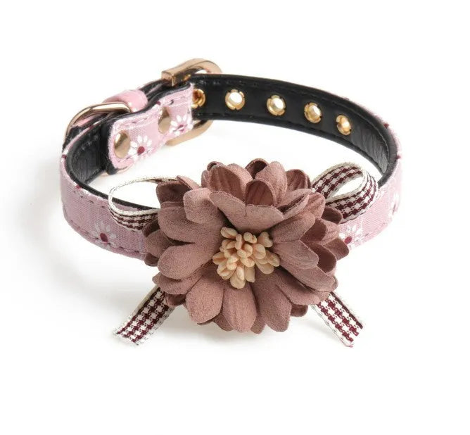 PU flower pet collar in dark pink with adjustable buckle, shown on a small dog