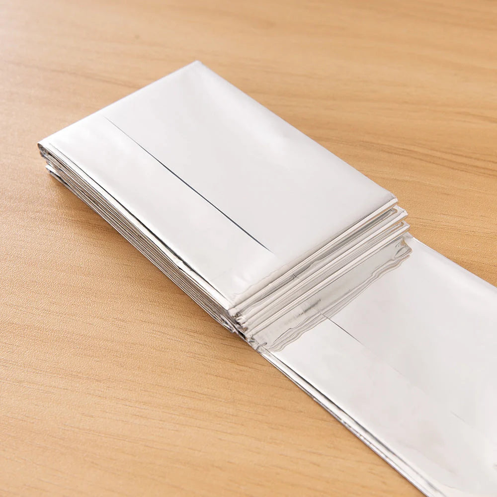 Double-sided silver and gold emergency thermal blanket for outdoor survival