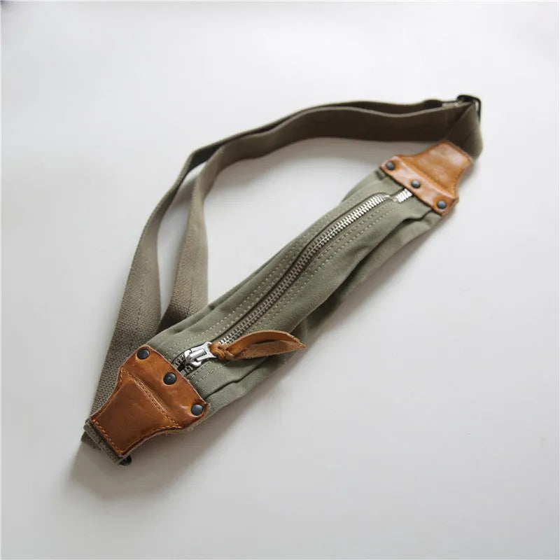 Green retro military style chest bag with washed canvas and cowhide leather detailing