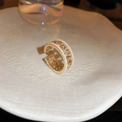 Pearl Hollowed-out Square Open-end Zircon Ring in gold, showcasing unique geometric design