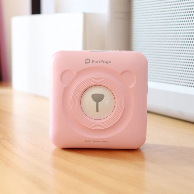 Portable handheld label mini thermal printer in white, pink, or blue