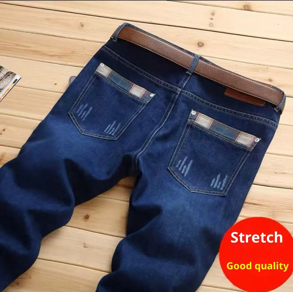 Men's slim-fit stretch skinny pants in dark blue denim, mid-rise, zipper fly