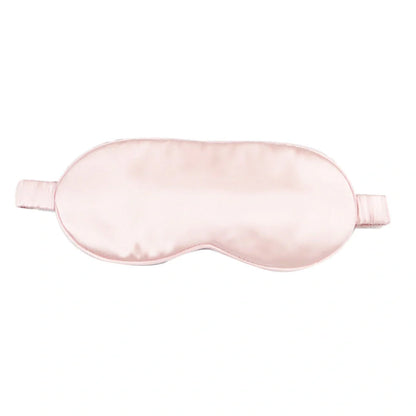 Silk double-sided eye mask in peacock blue and silver with adjustable strap, showing contoured nasal bridge design