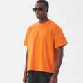 Men's loose fit pure cotton T-shirt in apricot, shown in an American casual style.