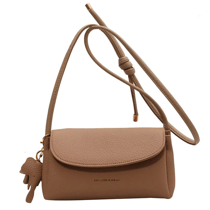 Soft PU leather small shoulder bag in khaki, pillow shape, 21cm width, with visible sewing thread details