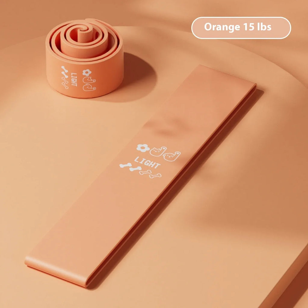 Colour-coded elastic resistance band showing pink, orange, beige, and green options for fitness and yoga