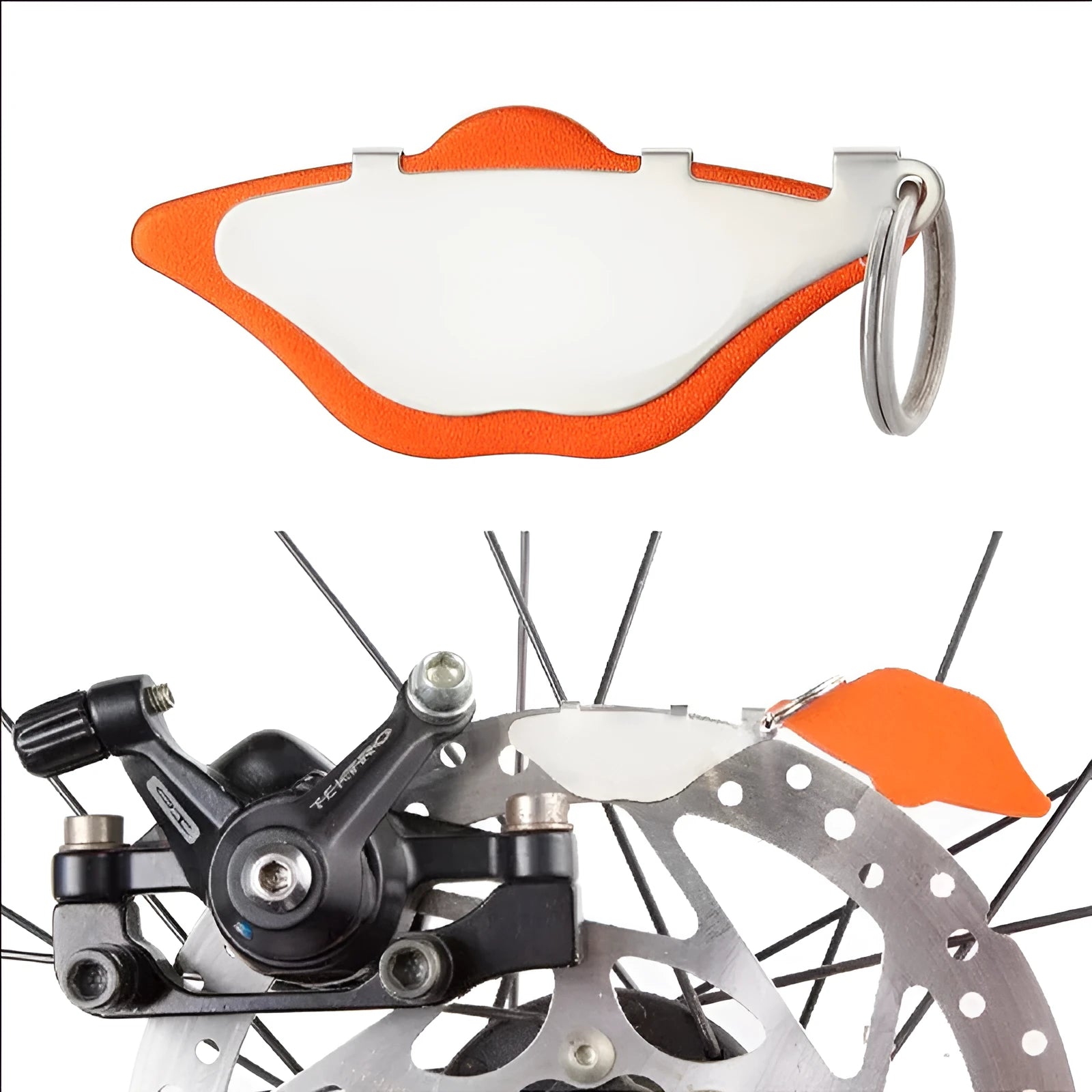 Mountain bike disc brake pads in black and orange with scratch-resistant metal construction