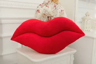 Plush big lips pillow in pink 60 cm tall with short plush fabric on a sofa