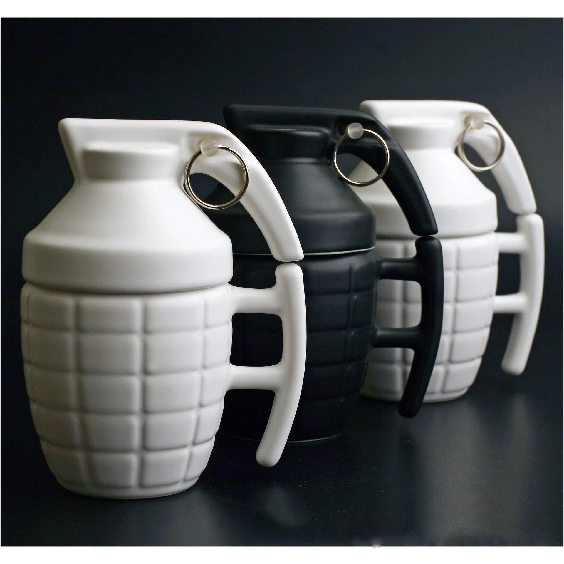 A grenade-shaped ceramic coffee mug with a lid, featuring a military-inspired design for a unique and tactical look.