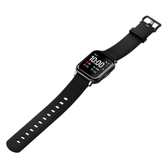 Black waterproof smart bracelet with 1.4-inch screen and silicone strap on a wrist