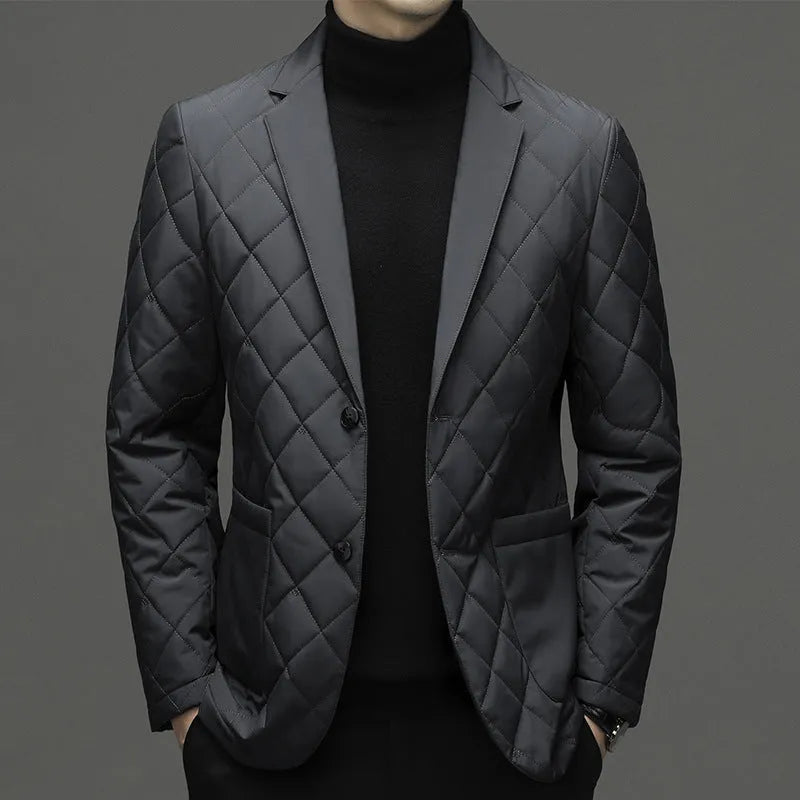 Man wearing a thick black lapel down jacket with side seam pockets.