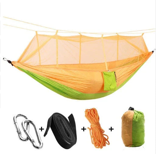 Parachute hammock with mosquito net in various colors and sizes, ideal for outdoor adventures and relaxation