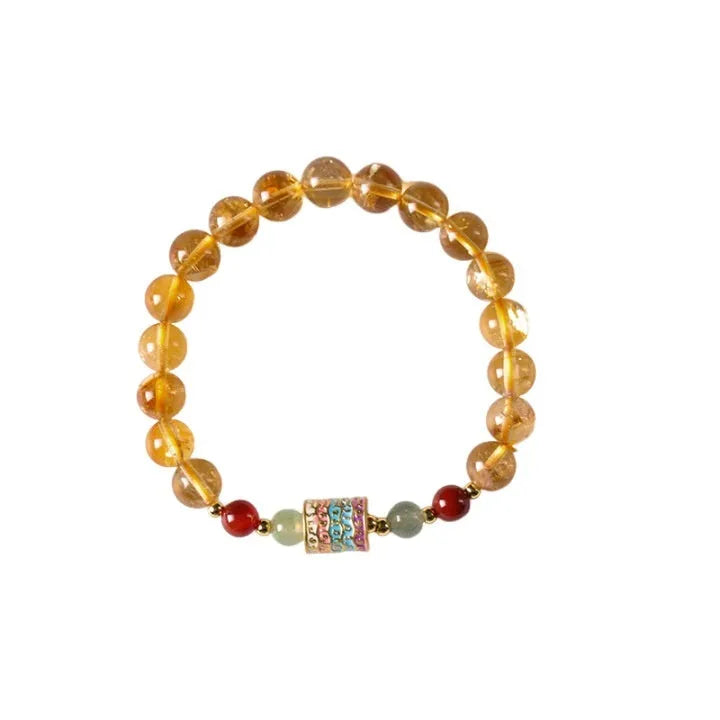 Women's citrine bracelet with 8mm prayer wheel design in yellow retro style