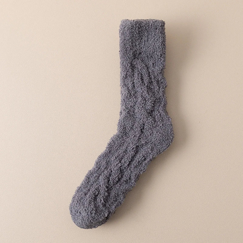 Cozy coral fleece socks in various colors, featuring soft velvet material and anti-slip design for comfort and warmth.