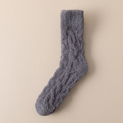 Cozy coral fleece socks in various colors, featuring soft velvet material and anti-slip design for comfort and warmth.