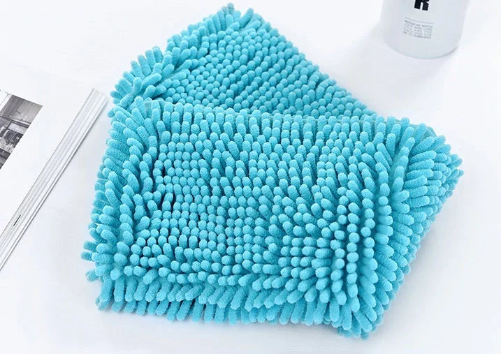 Plush, super absorbent pet towels in various colors and sizes for bathing and grooming cats and dogs