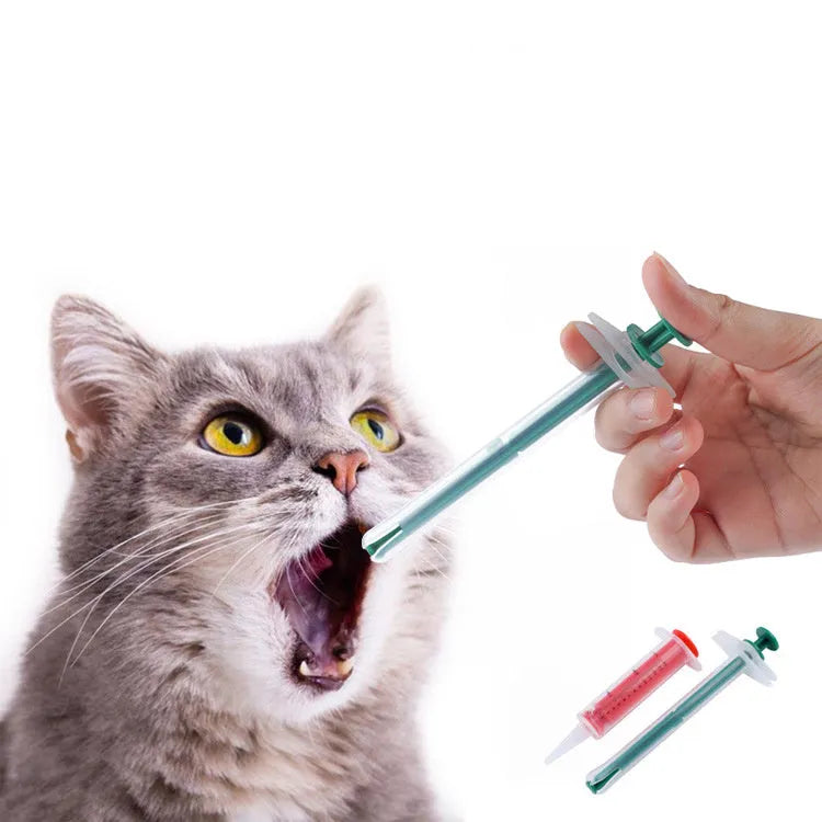 Two pet pill shooters with soft silicone tips in different sizes for administering tablets to cats and dogs