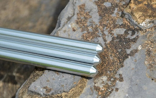 Silver aluminium camping tripod with hanging chain for outdoor barbecue cooking