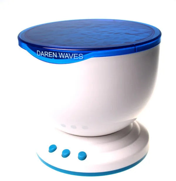 Blue ocean themed LED projection lamp for children's rooms on a shelf.