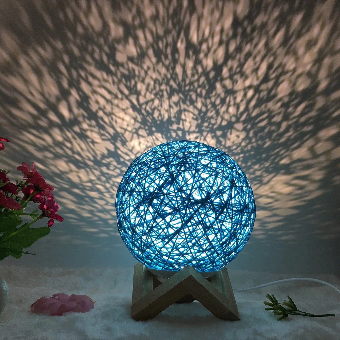 LED rattan table lamp with hand-knit lampshade in various colours