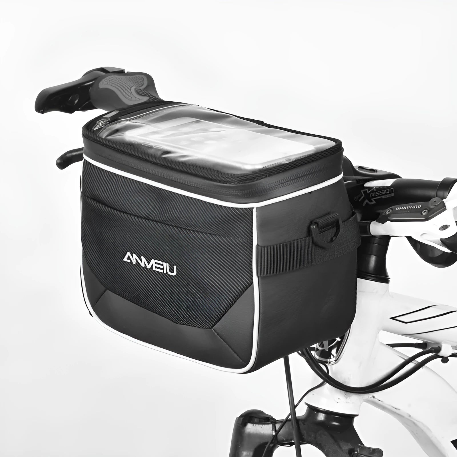 Black 7-inch polyester bicycle handlebar bag mounted on bike, showing compact folding design.
