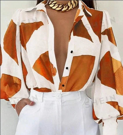 Women's geometric print lantern sleeve blouse in multicolor and orange options