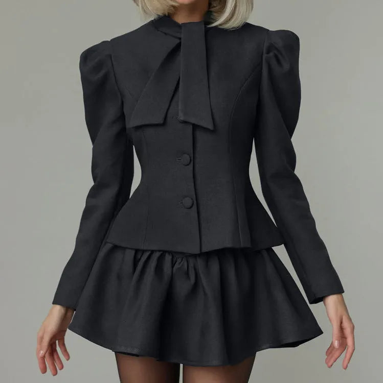 Women's gray bow tie long sleeve suit top and short skirt two-piece set on model