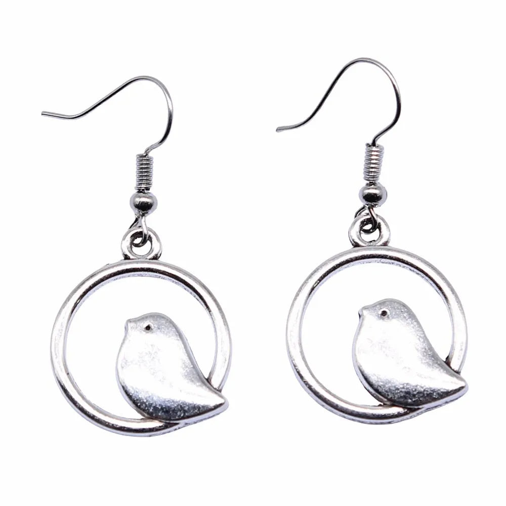 Retro simple handmade ornament bird earrings in ancient silver with zinc alloy body and iron ear hooks