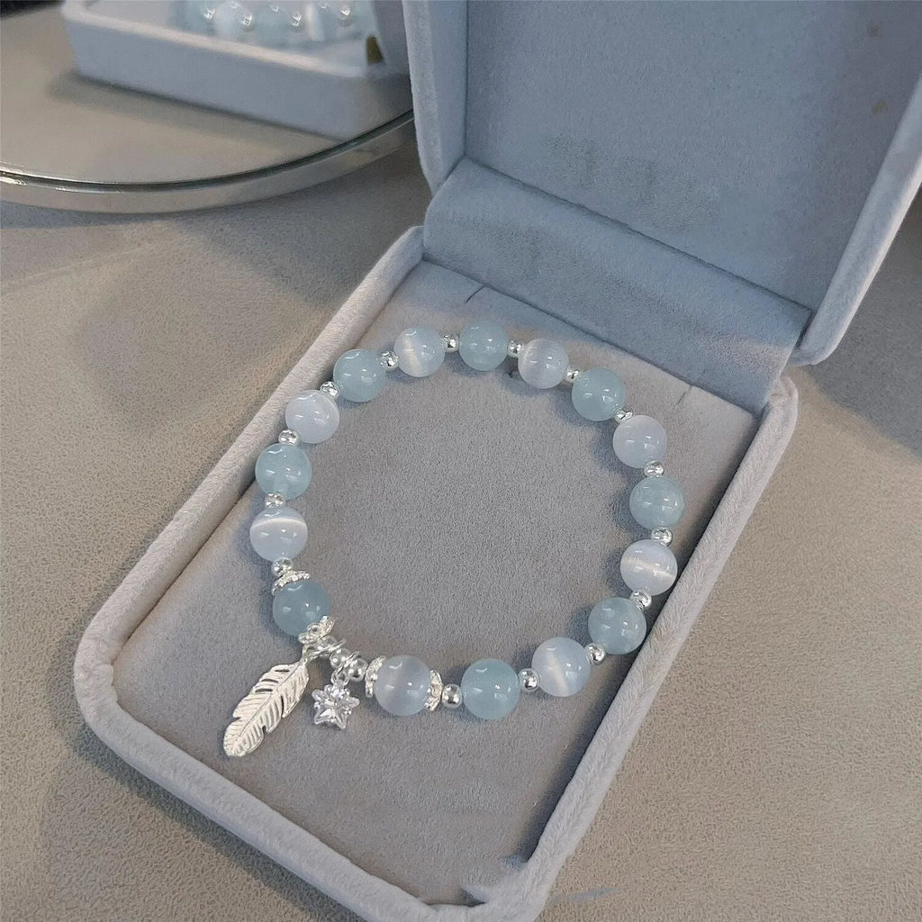Korean style crystal bracelet with blue moonlight glass beads and eight pointed star charm