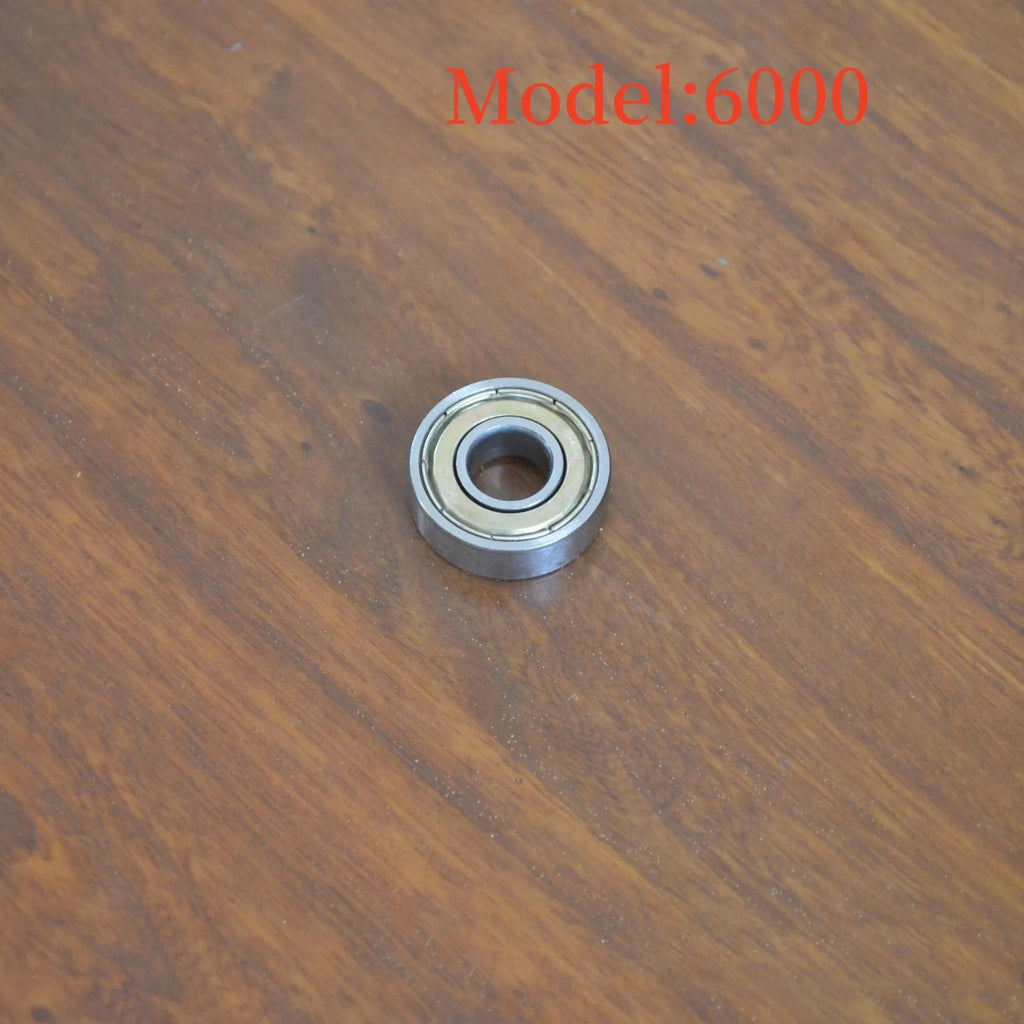6000zz carbon steel miniature ball bearing showing 10mm inner diameter and 26mm outer diameter.