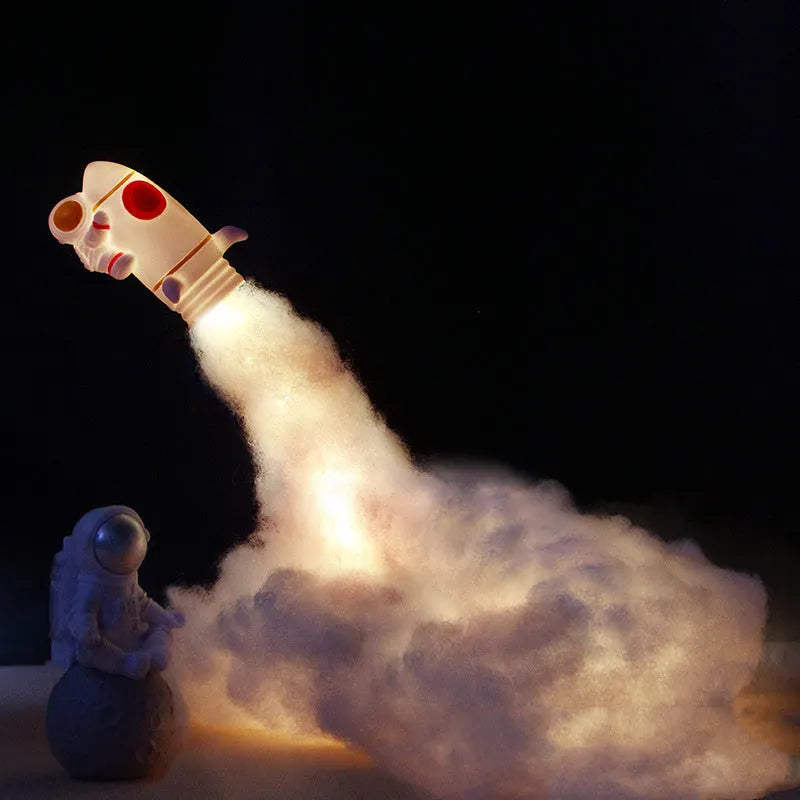 DIY astronaut rocket night light kit with warm LED lighting and assembly materials